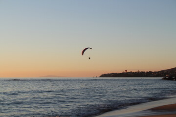 paraglider over the ocean