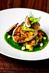 Chicken breast, pan seared to a crispy golden brown in brown butter and served with farm fresh organic vegetables: carrots, Brussels sprouts and green beans. Classic American restaurant favorite.