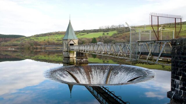 Pontsticill Reservoir with Bell-mouth spillway and valve tower, South Wales, United Kingdom
