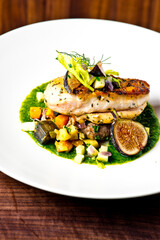 Chicken breast, pan seared to a crispy golden brown in brown butter and served with farm fresh organic vegetables: carrots, Brussels sprouts and green beans. Classic American restaurant favorite.