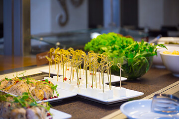 Served tasty meal on the table in restaurant close up view