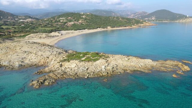 Aerial of the beautiful white sand beaches by Chia, Sardinia, Italy