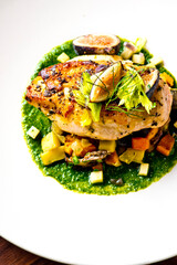 Chicken breast, pan seared to a crispy golden brown in brown butter and served with farm fresh organic vegetables: carrots, Brussels sprouts and green beans. Classic American restaurant favorite.