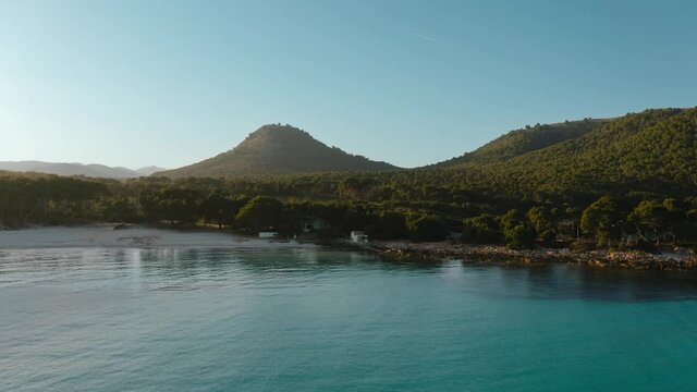 Aerial drone shot in Cala Agulla. Beach in Mallorca, Balearic Island