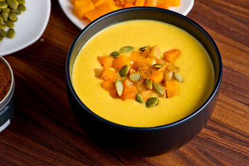 Butternut Squash Soup. Classic American Restaurant or Diner favorite. Homemade soup with chicken broth, noodles celery carrots seasoned with salt and pepper and garnished with Italian parsley. 