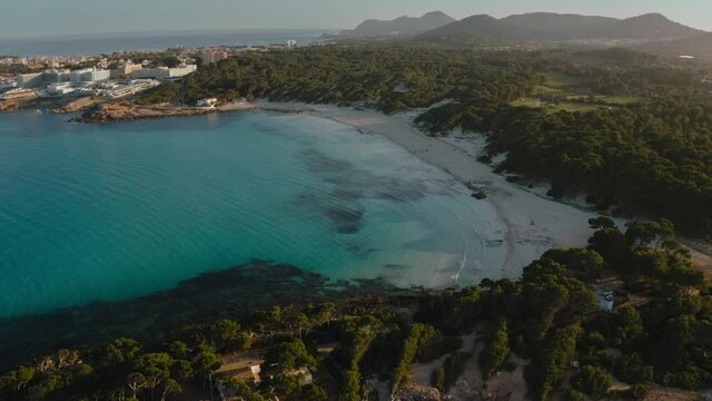 Aerial drone shot in Cala Agulla. Beach in Mallorca, Balearic Island