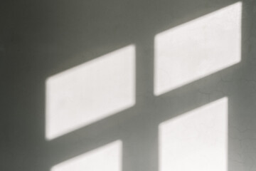 White wall with window shadow.