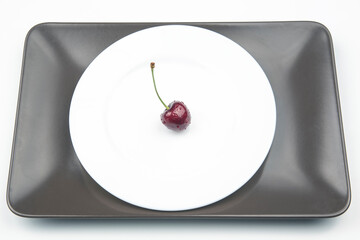 juicy cherry berry on a white background. fruits and vitamins. healthy food for breakfast. fruits of vegetation. fruit dessert