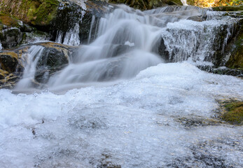 Beautiful frozen waterfall in the winter