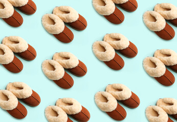 Soft slippers on pale light blue background, pattern design