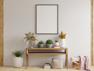 Mock up poster frame on cabinet in interior.