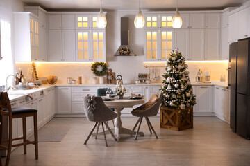 Stylish kitchen interior with beautiful Christmas decor