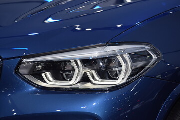 Beautiful parts of the new car. Car headlights, headlights, body lights, modern and sporty look
