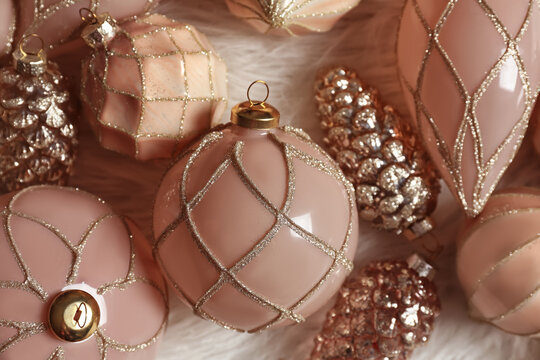 Collection Of Beautiful Christmas Tree Baubles On White Faux Fur, Closeup