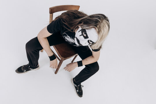 Sexy girl in a corpse-paint black white