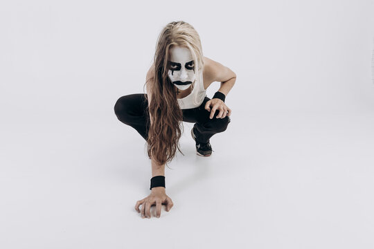 A corpse paint design, pictured here on a smoking man attending
