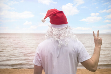 santa claus on beach vacation relaxing