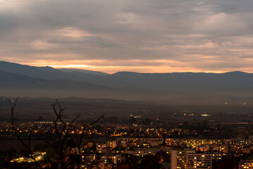 Obraz premium Sunset over polluted smog city environmental question conversation concept ecology nature Plovdiv, Bulgaria