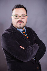 Solid cheerful man in spectacles emotional portrait