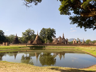 Fototapeta na wymiar Wat Mahathat Temple, Sukhothai Province Is a temple in the area of Sukhothai since ancient times Wat Mahathat is located in the Sukhothai Historical Park.