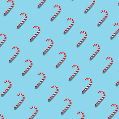 Fototapeta na wymiar Christmas candy on blue background. Christmas Candy flat style in Top view.