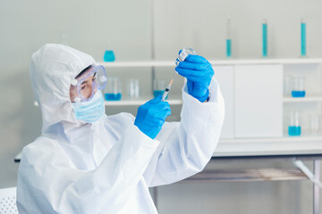 Scientist covid-19 virus chemistry  research experiment biotech antibody sample laboratory...