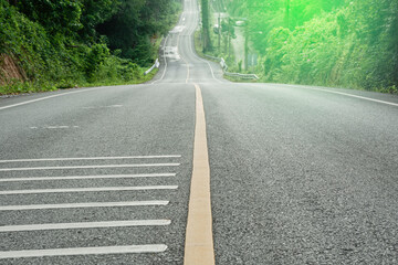 Beautiful green road in countryside, Landscape road with green forest, Main road on the mountain