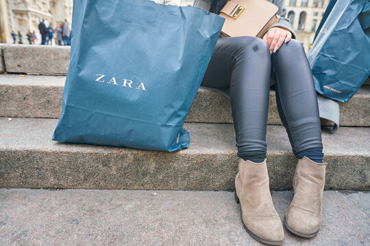 MILAN, ITALY - CIRCA NOVEMBER, 2017: Woman With A Zara Branded Shopping Bag In Milan