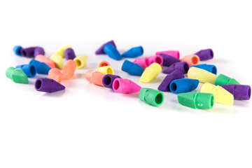 Scattered rubber pencil topper erasers in multiple colors
