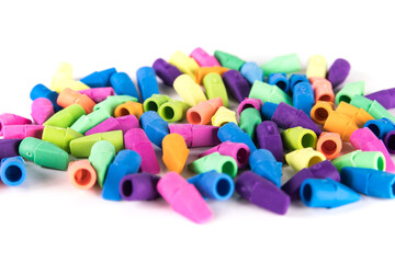 Pile of rubber pencil topper erasers vibrant and pastel colors yellow blue purple pink green