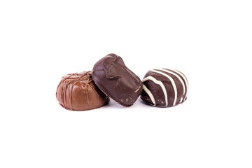 Milk dark and striped filled chocolate bonbon snuggling together