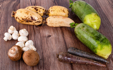 Champignon Mushroom and Lotus Root on wooden table background