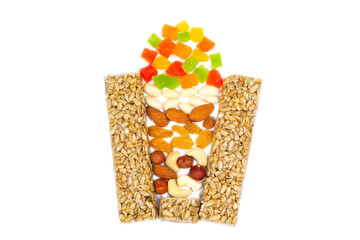 Nuts in form of glass. Fitness diet super food. Energy cereal healthy meal. Muesli, seeds,...