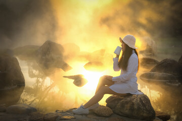 Woman sitting in the morning to relax.Young women drinking coffee on vacation.