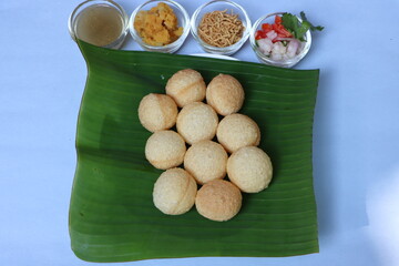 Pani Puri or Pani batasha or golgappa, popular Indian snack and street food © Pravruti