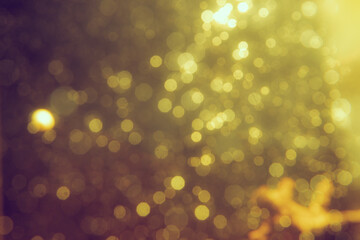 Gold bokeh blur defocus in black backgeound