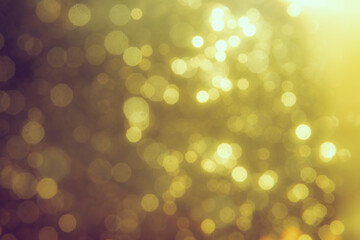 Fototapeta premium Gold bokeh blur defocus in black backgeound