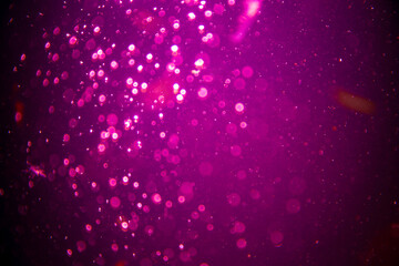 Fototapeta na wymiar Abstract pink defocus bokeh glitter