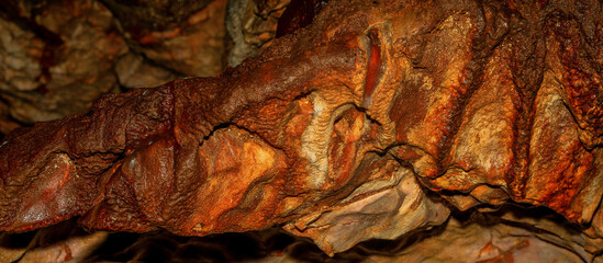 Fototapeta na wymiar Detail of cave wall, stalactites and stalagmites. Oylat Cave, Bursa, Turkey