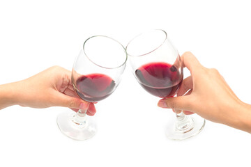 Cheer a glass of two red wine isolated