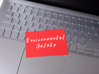 Business concept about Environmental Safety with sign on the page.