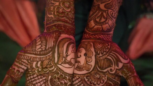 Indian wedding, Indian bride with mehndi on hands.