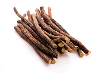 Licorice roots on white background