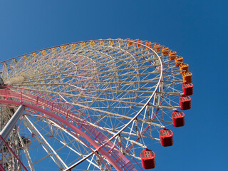 ferris wheel on a blue sky