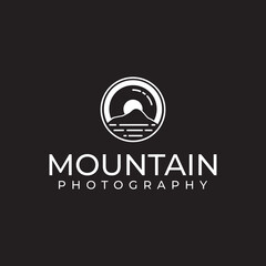 lens and mountain for outdoor adventure nature photography photographer logo design