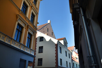 Fototapeta na wymiar Medieval buildings on the street in Old Town of Riga, Latvia, Baltic States