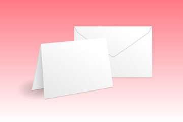 White standing greeting card and envelope mockup template. Isolated on gradient pink background with shadow.