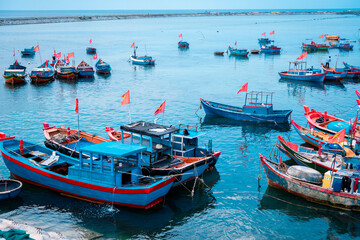 many colorful boat and fisher at Ly Son Island, Quang Ngai Province, Vietnam
