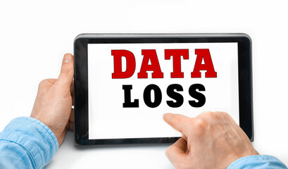 Closeup of a male hands holding tablet pc with text Data Loss