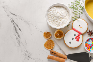 Ingredients for Christmas cookies and kitchen utensils on white background